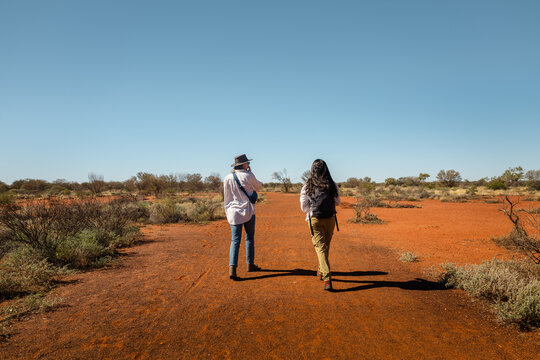 Women walking in the desert
