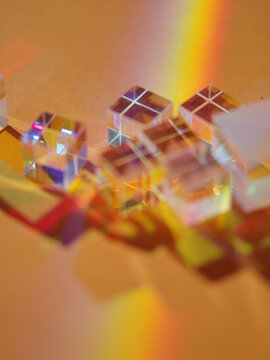 A rainbow is reflected in a bunch of cubes