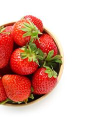 Bowl of fresh strawberries on white background