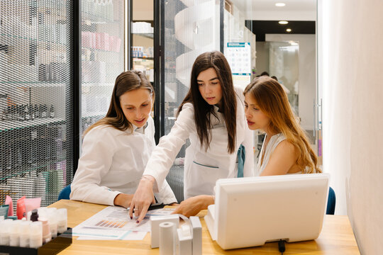 Pharmacists collaborating on healthcare planning and medication review