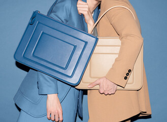 Stylish Business People Holding Elegant Leather Bags