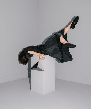 Abstract Performance Art With Woman in Black Dress