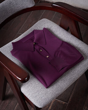 Purple Polo Shirt On Chair