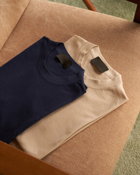 Navy and Beige T-Shirts on Chair