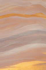 Obraz premium Art Watercolor and Acrylic brushstroke smear wave lines painting wall. Abstract texture beige, Gold, bronze, beige pastel color stain background.