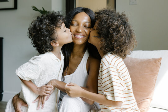 A portrait of mother with two sons