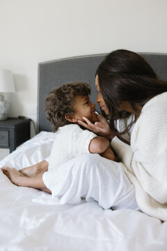 Mother and son together portrait at home