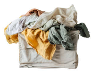 Laundry basket overflowing with colorful clothes ready for washing isolated on transparent background