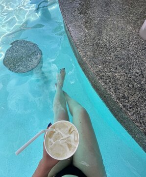 Drinking cocktail in pool's bar 