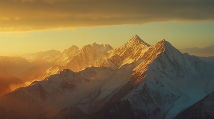 Naklejka premium A stunning mountain top view with the sun breaking through the clouds above