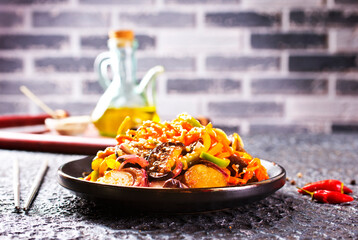 Summer Vegetable spicy stew of zucchini, potatoes, peppers, onions, tomatoes and eggplant
