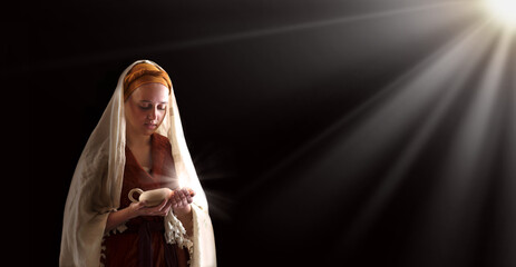 Young pretty girl with candle