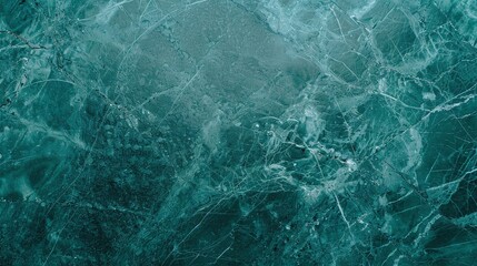 Naklejka premium Elegant Dark Teal Marble Texture with Rich Veining and Bold Cracks, Perfect for Backgrounds, Banners, or Marketing Materials. Ideal for Luxurious Designs, Copyspace, and Minimalist Layouts.
