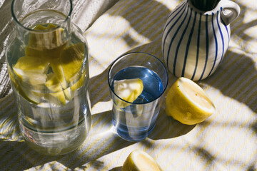 Water with lemon on a hot summer day