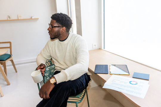 Black Man In The Office.
