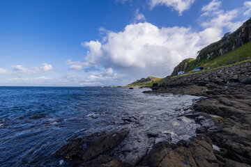 Scenic, Rocky Beach, Water, nature, coastal, oceanic landforms, cliff, sea, shore, mountain, grass, plants, rocks, rock, landscape, sky, beach, coast, water, stone, travel, ocean, clouds, cloud, summe