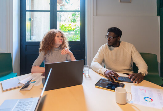 Team Discussion In Modern Office.