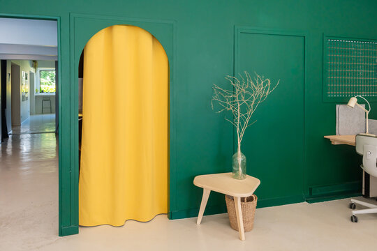 Bright Coworking Space with Yellow Curtain

