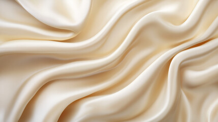 Obraz premium Cream satin fabric with gentle curves and delicate texture. Textile background.
