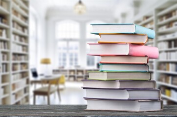 Set of reading books on table in library, education