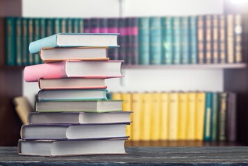 Set of reading books on table in library, education