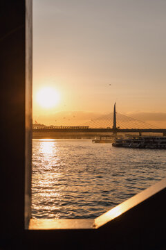 Sunset over Bosphorus Framed by Window
