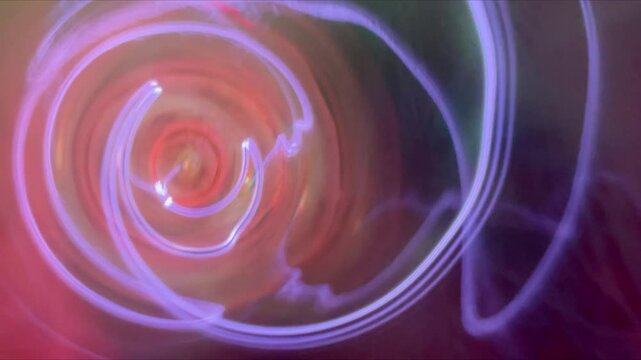 Pink gas electric discharge in transparent glass tube