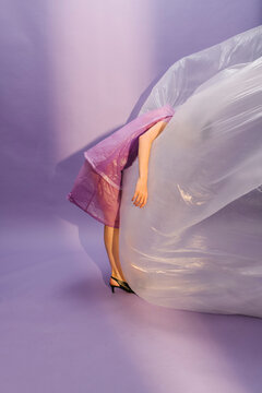 Surreal Art Concept of Person Encased in Plastic Sheet