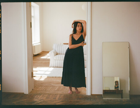 Woman In Black Dress, Doorway Reflection