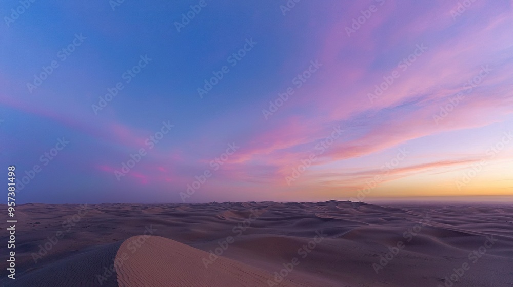 Sticker a picturesque desert scene with rolling sand dunes beneath a sky blending pink and blue hues, framed