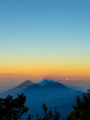 Volcanoes and Mountains at Sunrise