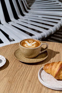 Latte and a croissant