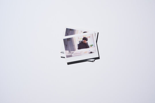 Instant Photos of a Person Working at a Desk