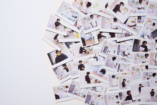 Man Posing for Photos in a White Room