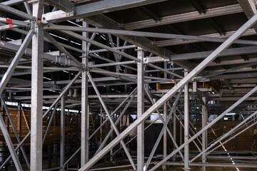Metal structure to support a stage, thick sturdy bars.