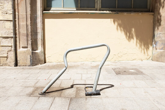 Squeaky/broken/stretched/ bike/bicycle stand in urban city view 