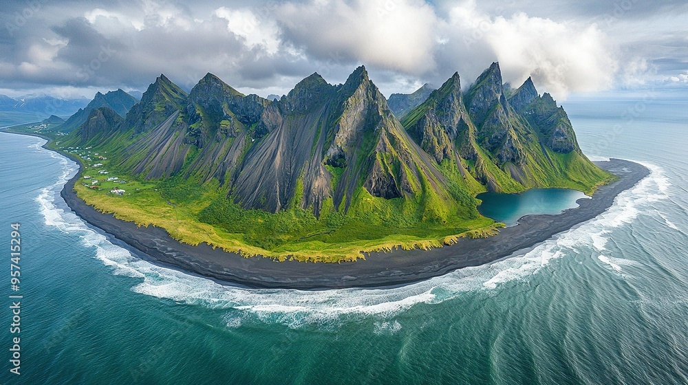 Poster a small island in the middle of a body of water surrounded by a mountain range on one side and an op