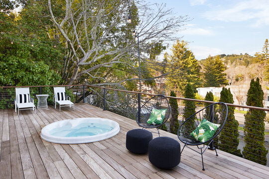 Hot tub on deck of modern design cottage