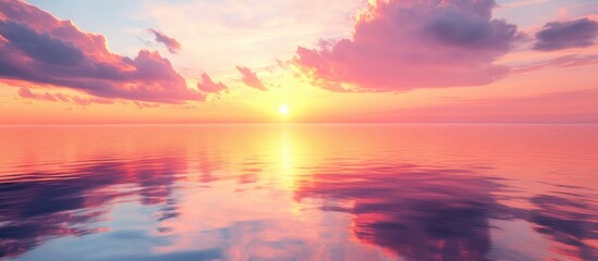 Fototapeta premium Vibrant sunset illuminating the sky with hues of orange and pink casting reflections on tranquil waters below