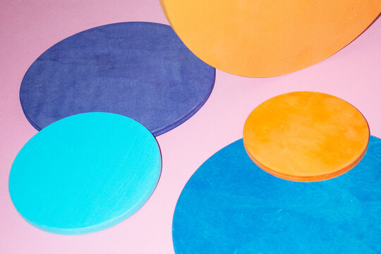 Geometric colorful disc circle shapes with hard direct flashlight