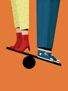Anonymous couple balancing on ball