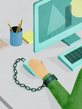 Manager using computer mouse connected with handcuffs