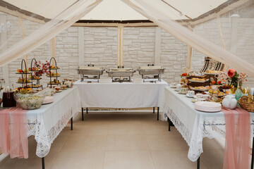 Catering table with food at the party