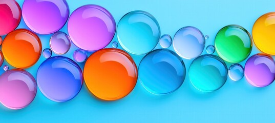 A vibrant arrangement of colorful translucent bubbles on a smooth blue surface, creating a modern desktop wallpaper.