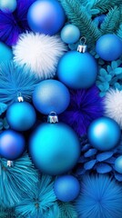 Close-up of blue and white Christmas baubles nestled among festive, fluffy decorations and evergreen branches. Modern holiday decor concept.