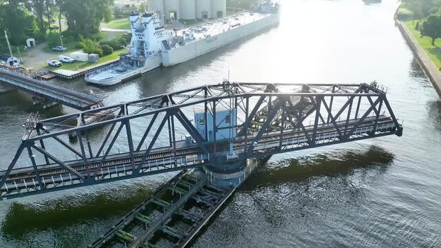 Aerial Arc Shot of St. Joseph Swing Bridge and Docked Ship