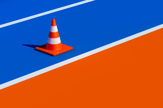 Traffic cone on blue and orange surface
