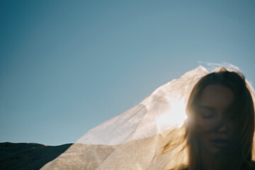 Unusual portrait of woman in sunlight