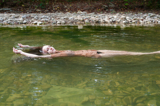 Woman In The River 