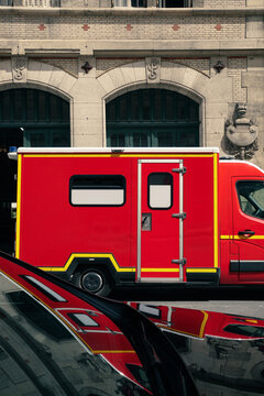 A red fire truck on the streets of Paris, cinematic view